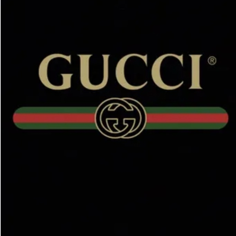 Gucci Black and Gold Emblem Design